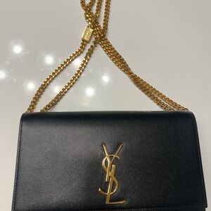 Saint Laurent Black Crossbody Bag with Gold Accents